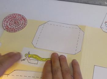 Glue pieces to heavy paper or thin cardboard