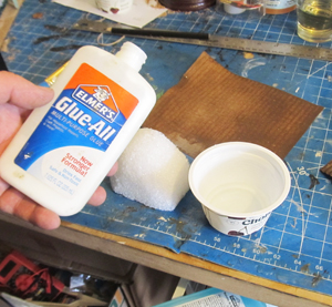 Mix glue and water