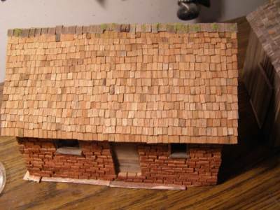 Brick building and wood thatched roof
