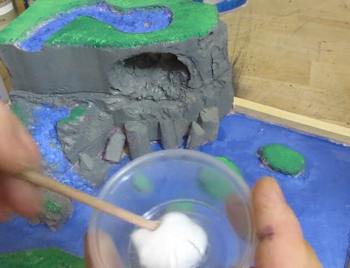 Adding glue to the cottonball