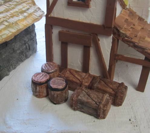 The crates and barrels on the diorama