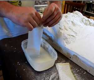 Wet the plaster cloth