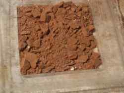 The crushed red brick