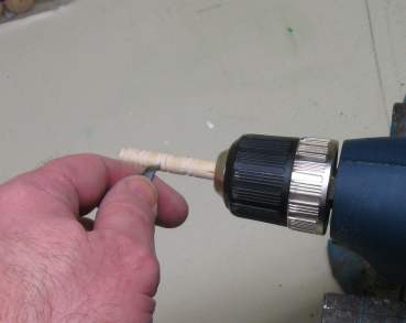 Turn the handle in a drill