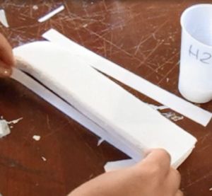 GLue the paper onto the handle