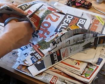 Cut strips of newspaper