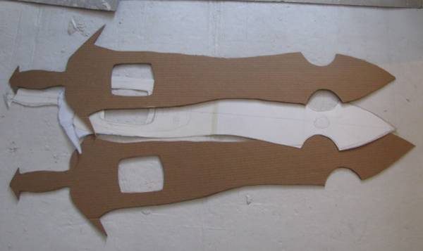 Cardboard mockups of the sword