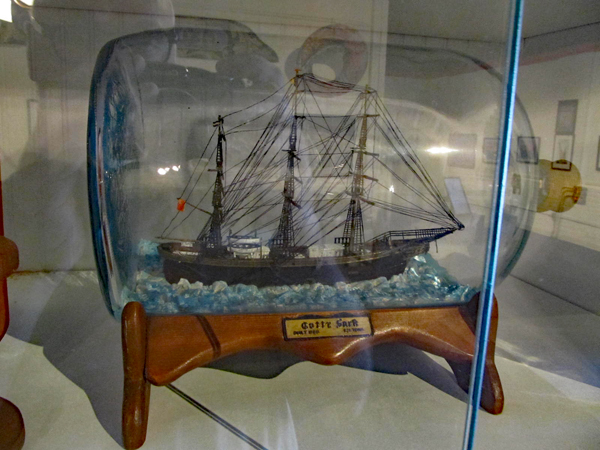 A ship in a bottle with stand