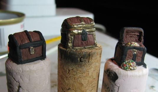 The three miniature treasure chests