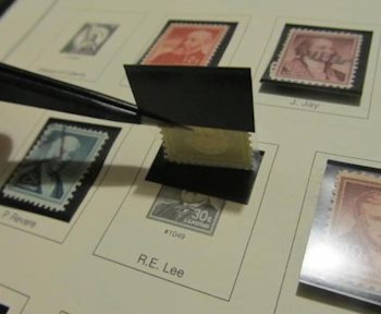 Lifting a stamp in a mount