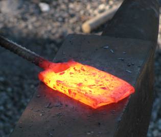 Glowing Iron on the Anvil