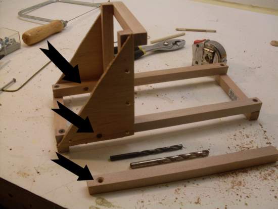 Where to drill the holes in the mangonel catapult