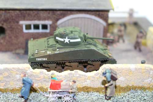 The tank and figures
