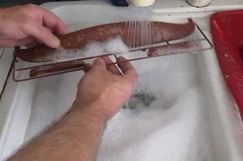 Rinse in soapy water