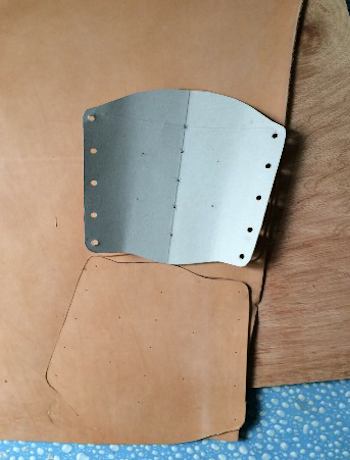 https://www.stormthecastle.com/leathercrafting/images/bracers/the-cardboard-template.jpg