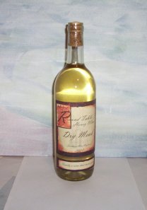 completed bottle of mead with label attached