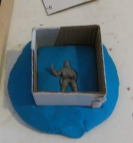 Press box into the clay