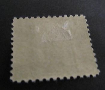 Hinge damage on stamp