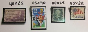 Four different mounted stamps